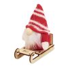 Lutin sur un traîneau en bois rouge