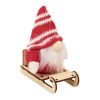 Lutin sur un traîneau en bois rouge
