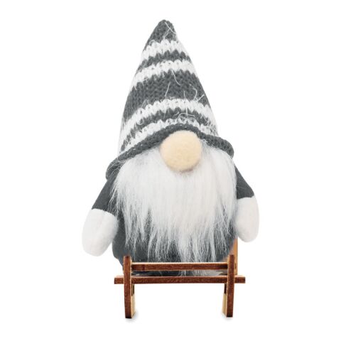 Lutin sur un traîneau en bois gris