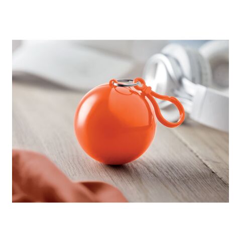 Poncho dans un emballage rond orange | sans marquage | non disponible | non disponible